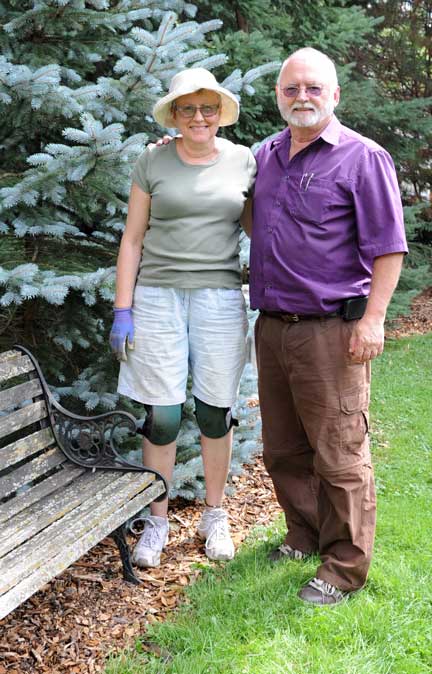 Barb and Randy Smith were busy fixing up their garden this week for the 13th annual Hampton Street Block Party on Sept. 6.[Whitney Neilson / The Observer]