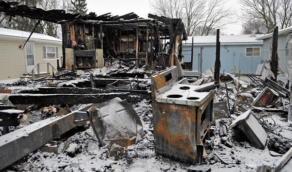 Flames gutted 105 Jessie Lee Ln. in Martin Grove Village near St. Jacobs during the wee hours of January 16. [Scott Barber / The Observer]