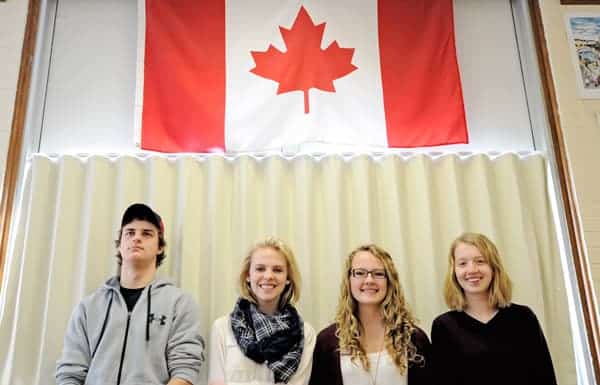 Bryan Metzger, Kate Bartley, Charly Bax, and Mhari Reid bid adieu to their classmates this week as they left for various countries in Europe on a three-month exchange trip.[Whitney Neilson / The Observer]