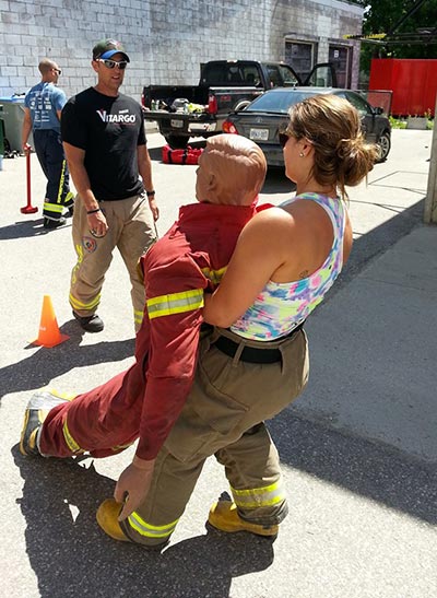 Wellesley firefighter Ryan Dosman (left) and Madison Lavigne (right) will be in Wasaga Beach this weekend for the FireFit competition, putting their training to the test. [submitted]
