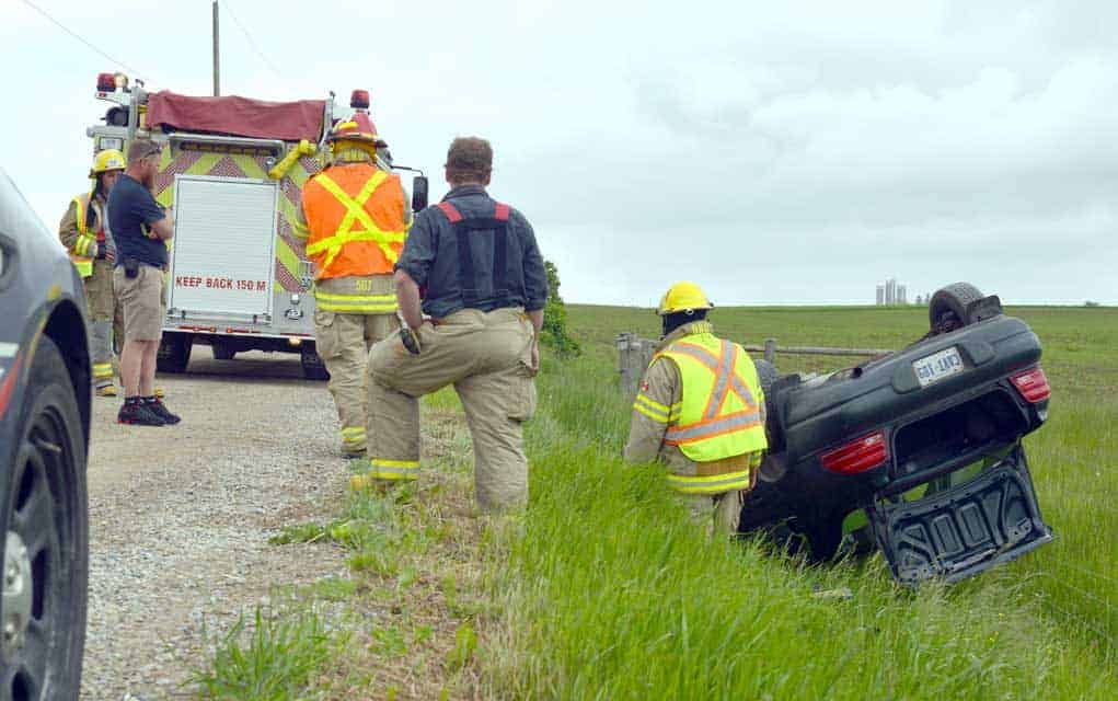 Car roll over on Tillman Road