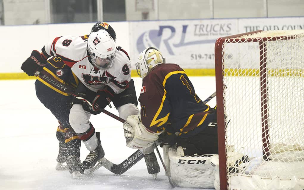 On the road, Wellesley Applejacks split a pair