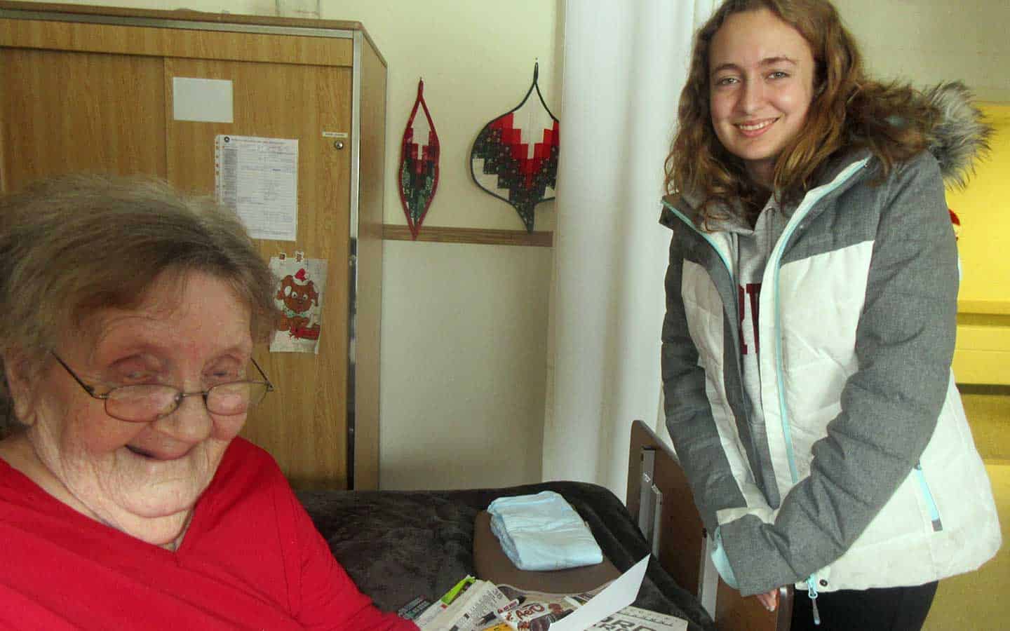 Students visit Twin Oaks residents before Christmas