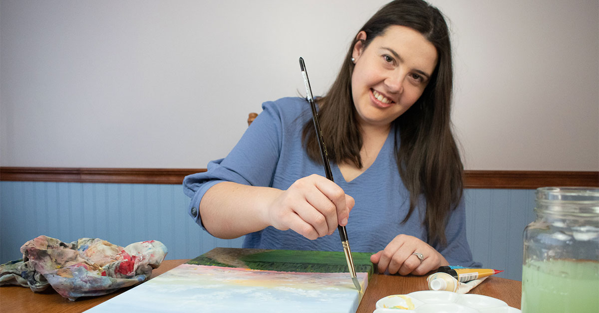 Going online to share her love of painting with others