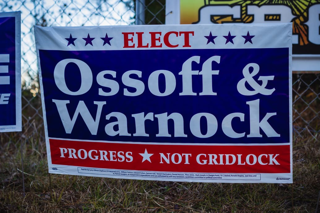 Ossoff and Warnock yard sign