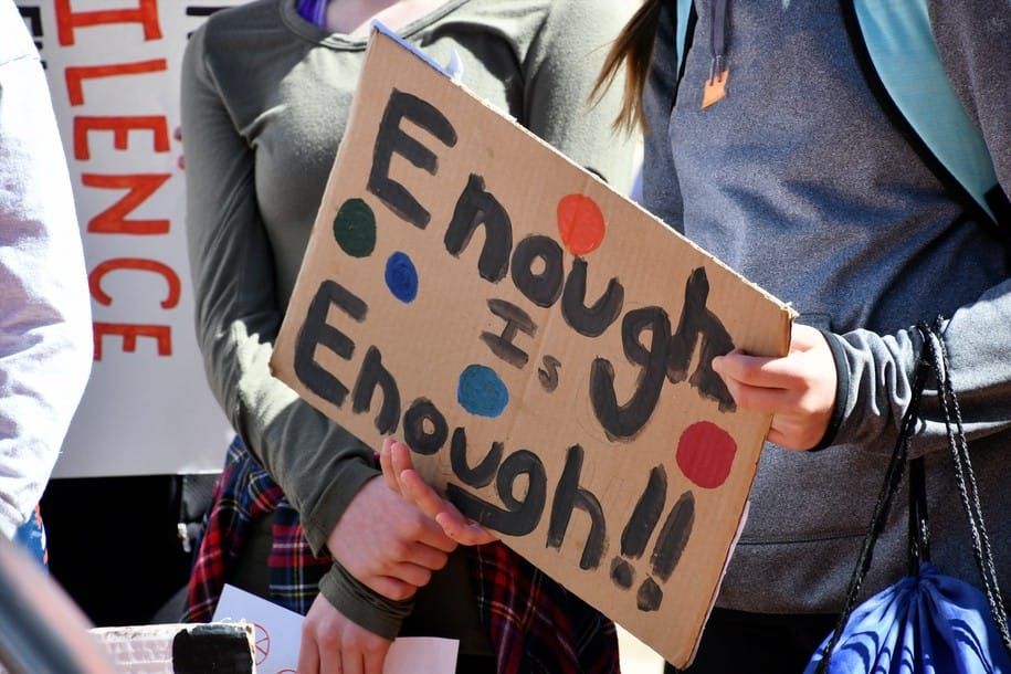 student-protesters-staging-a-walkout-march-due-to-school-shootings-and-gun-violence-real-people-human_t20_ro4EBw.jpg