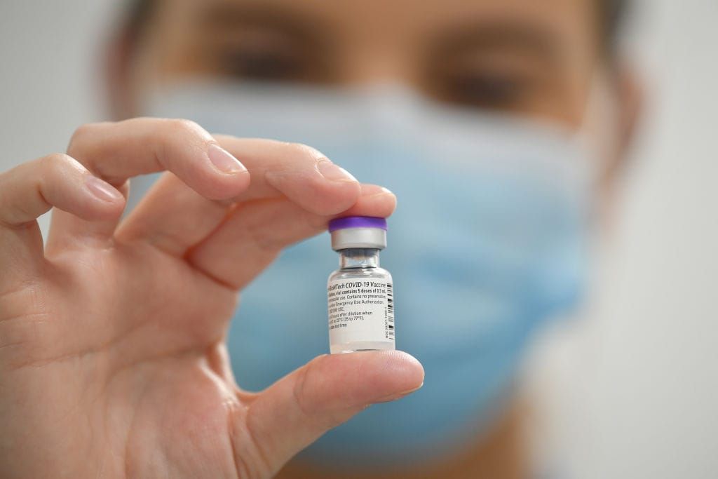 Without paid sick time, employers’ COVID-19 vaccine mandates won’t address workers’ access barriers or hesitancy
