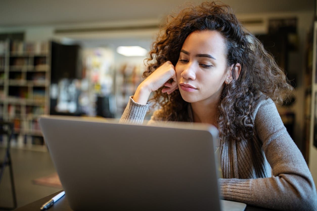 Student girl finding it difficult at study and comprehend scool tasks