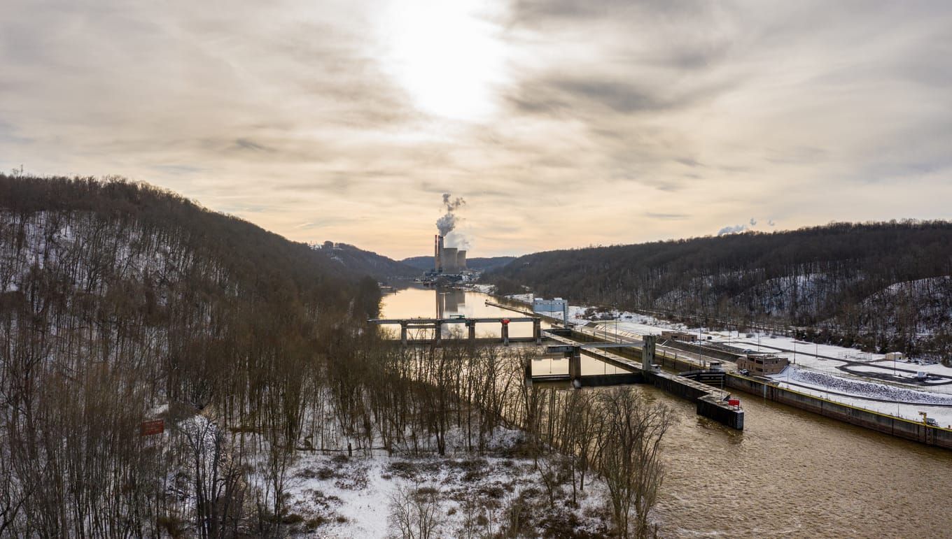 color photograph of the Monongahela River with mountains sloping gently in the distance