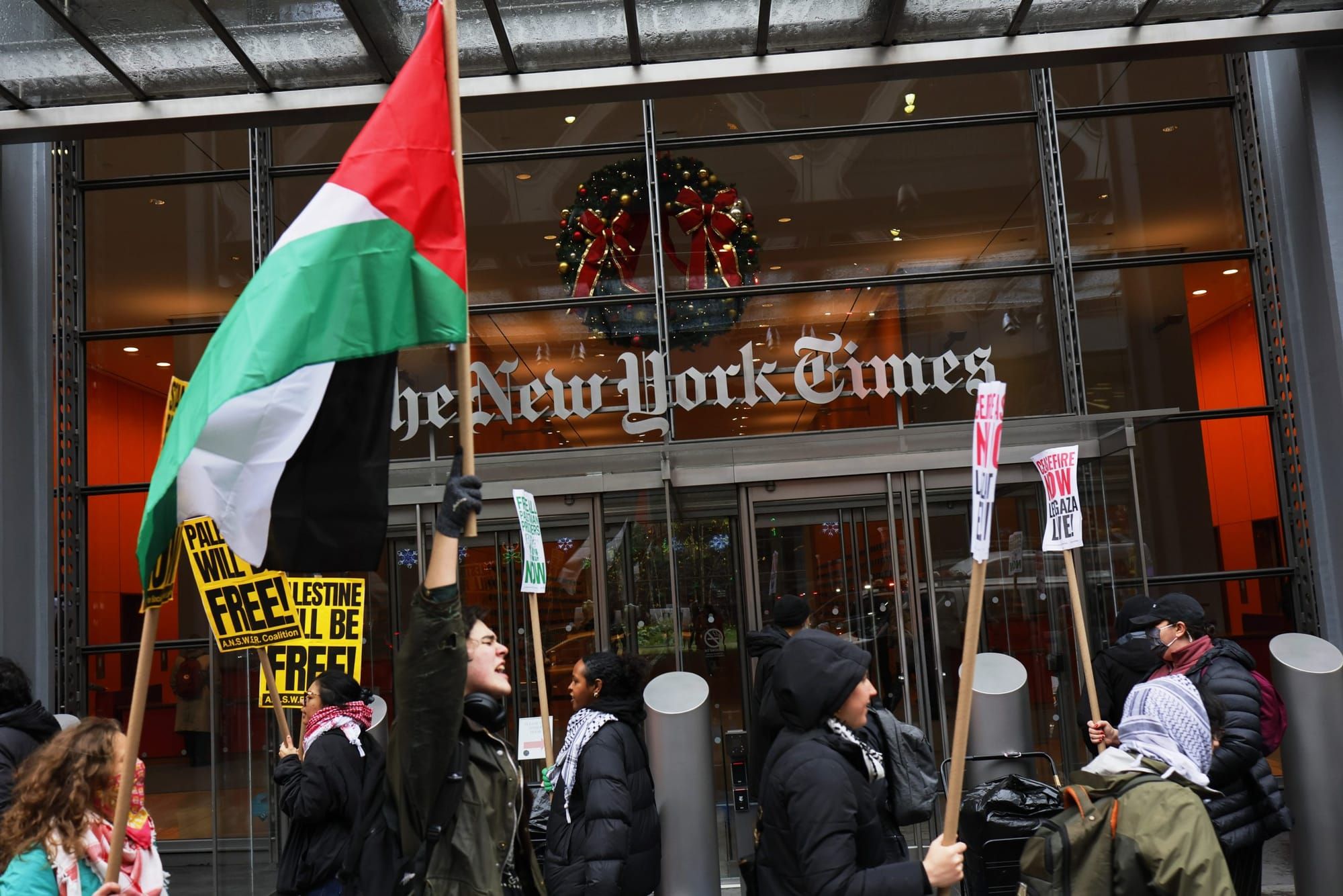 color photograph of a Palestinian liberation protest in front of The New York Times office in New York City