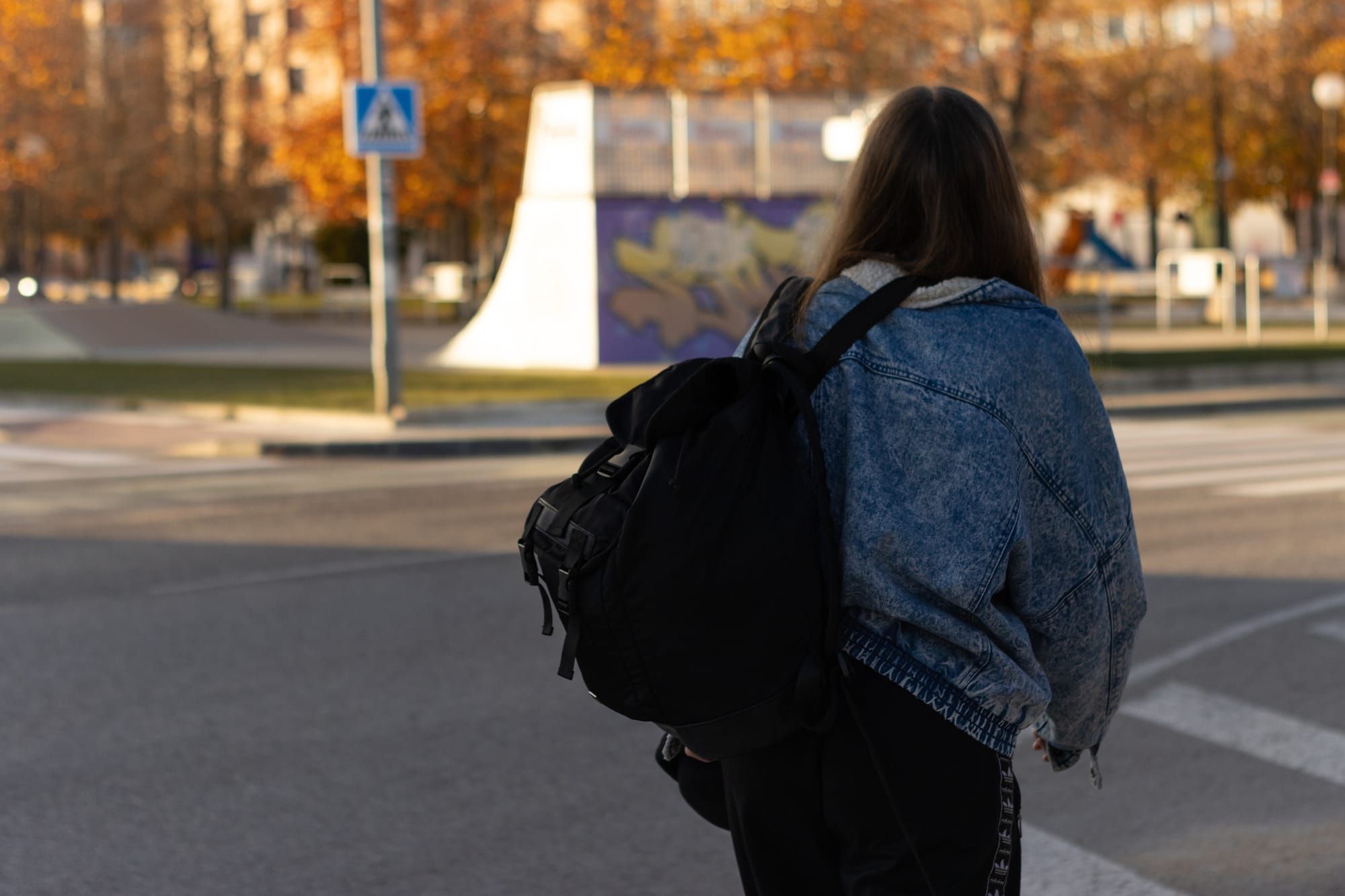 The process of eviction, and the aftermath, affect tenants lives in several ways. An unhoused young woman stands on the stree