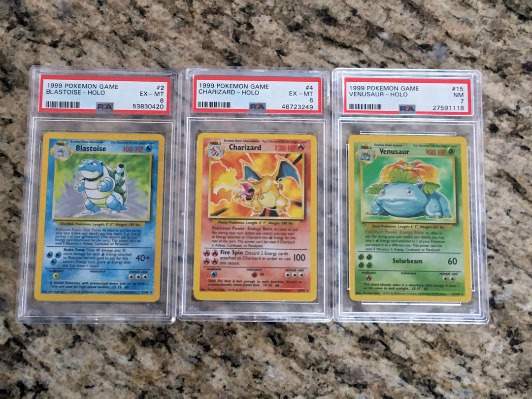Charizard, Blastoise, Venusaur, primera edición.