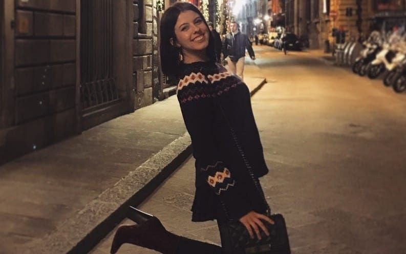 Photo of young Mariya in college on a Florence street.