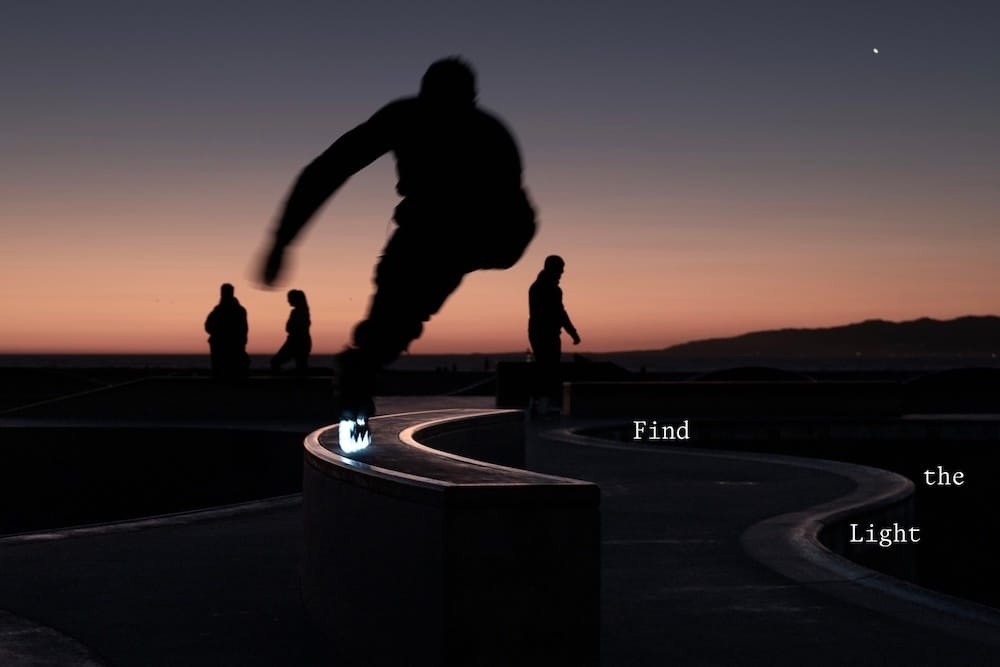 A photograph of a skater at night