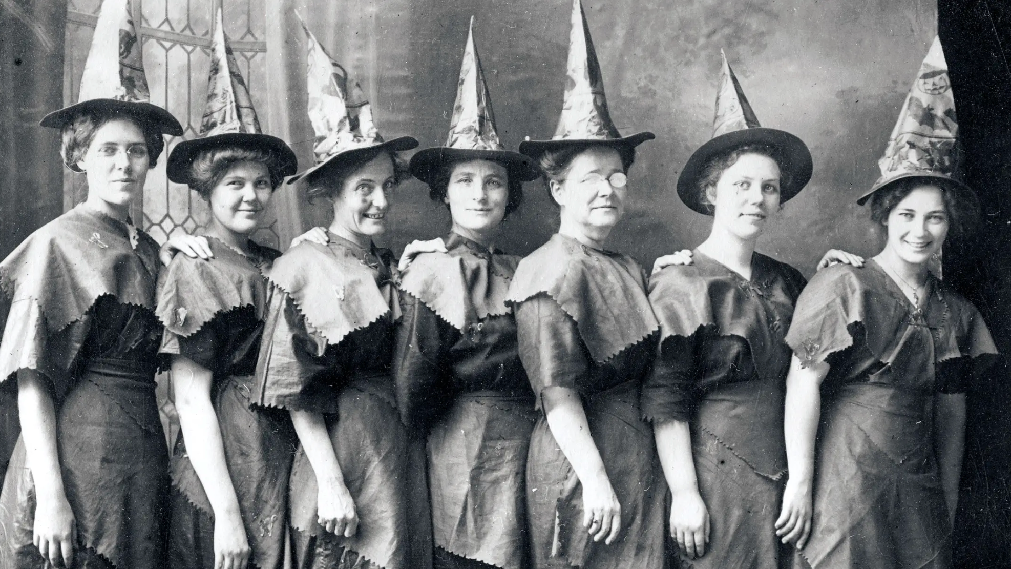 Vintage photo of women dressed at witches.