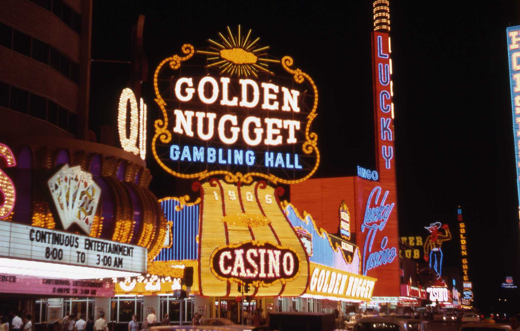 Las Vegas' "Golden Nugget" casino lit up in golden yellow neon in 1964.