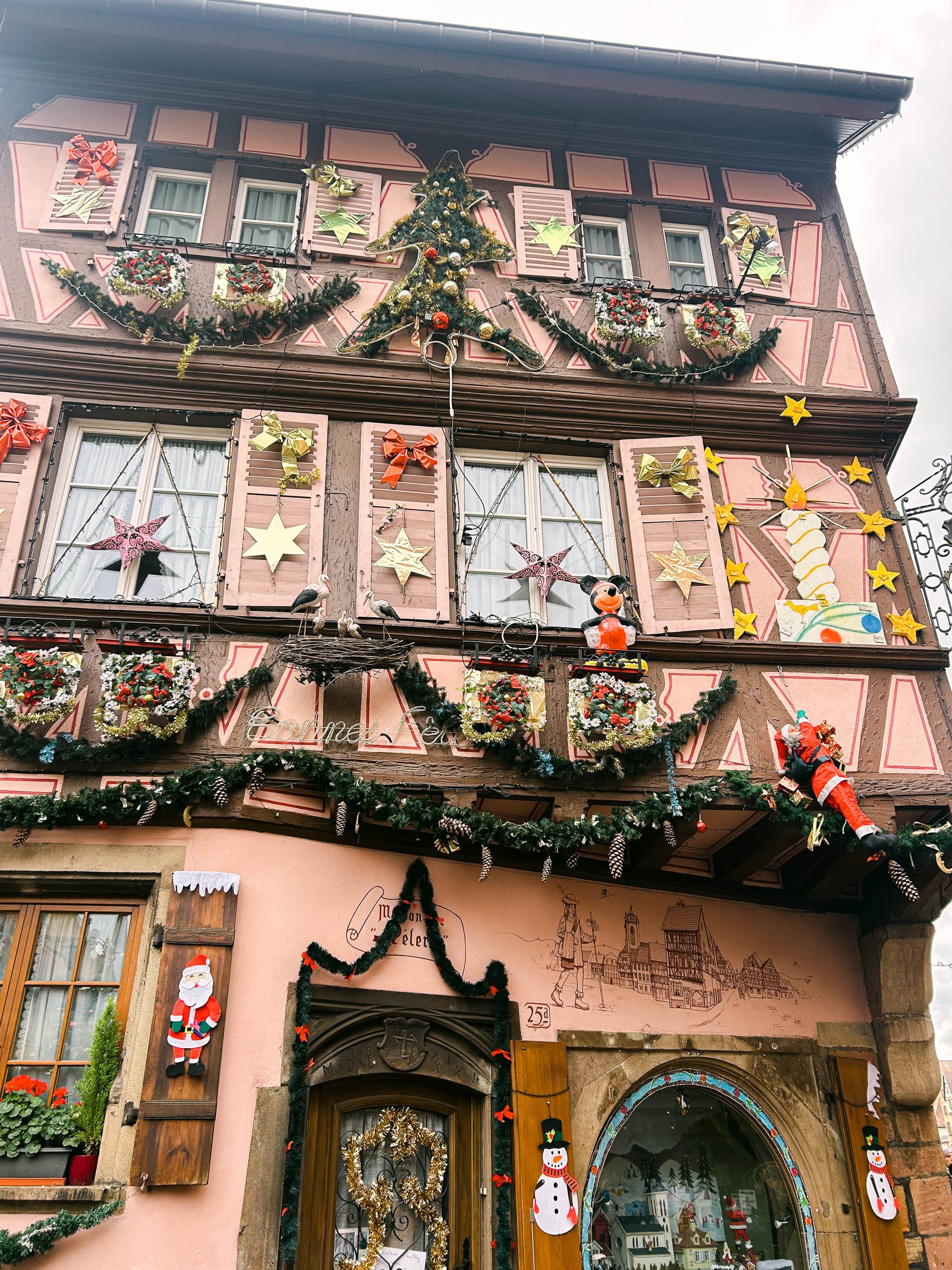 A building in Colmar, France festively decorated for the city's annual Christmas markets.
