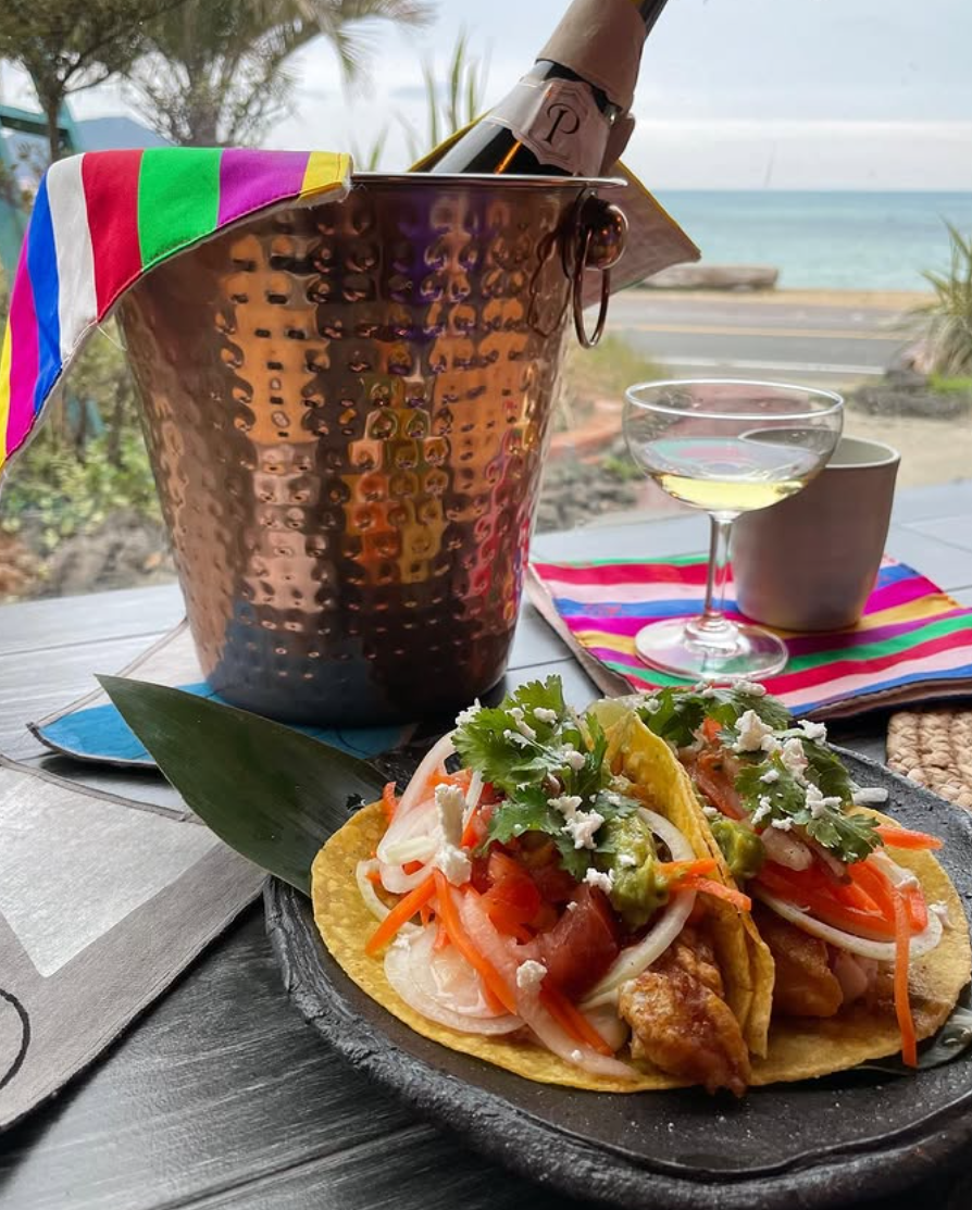 Fresh Mexican tacos and champagne at Sooking Taco Bar in Seongsan, Jeju with ocean view, a must-visit stop for Jeju car rental travelers