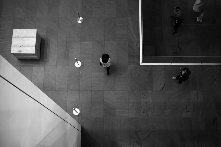overhead view of people walking in various directions