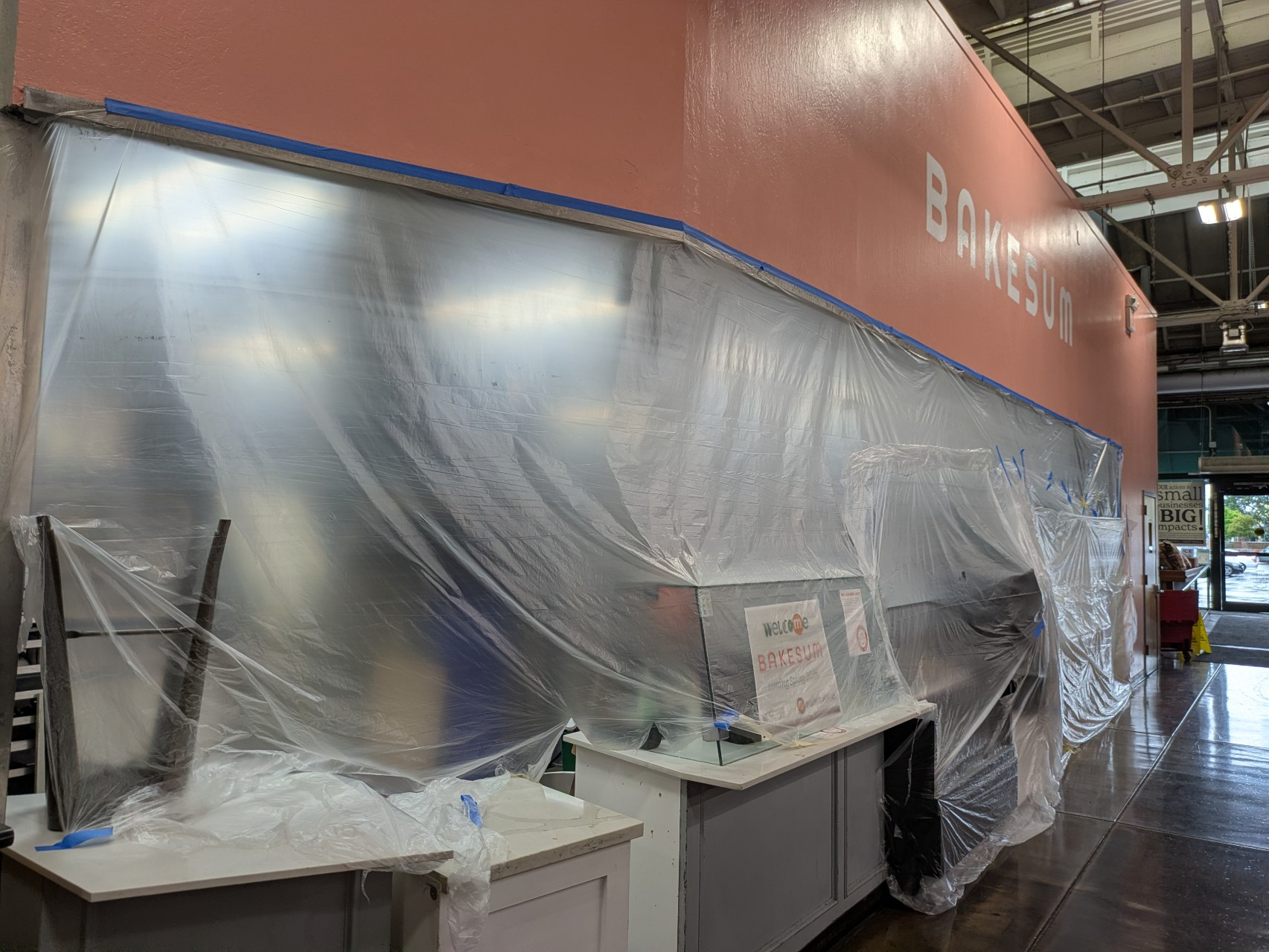 construction inside the Alameda Marketplace for Bakesum bakery's expansion into Alameda