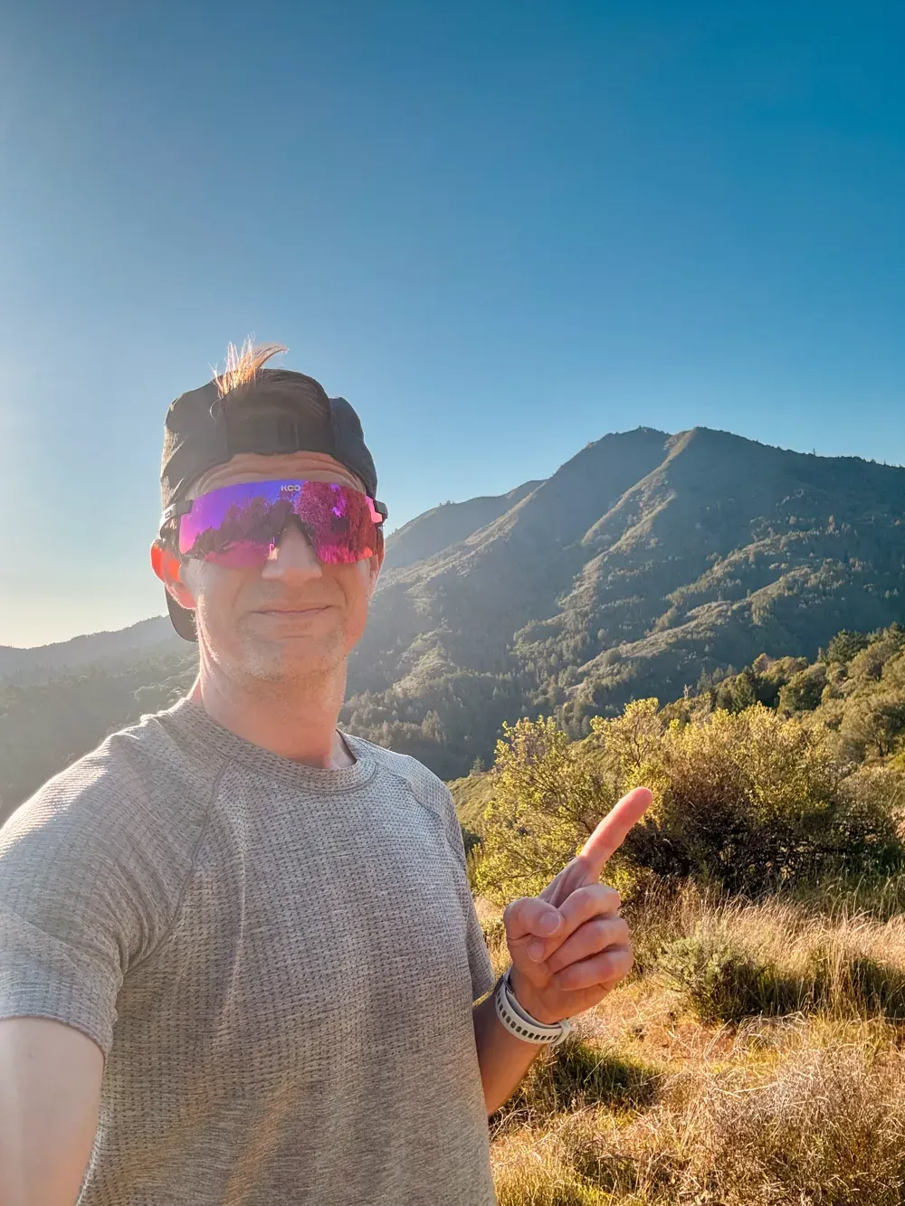 That’s me pointing at my local peak while runnign in The North Face VECTIV Infinite 3 – Reviewed by Alastair