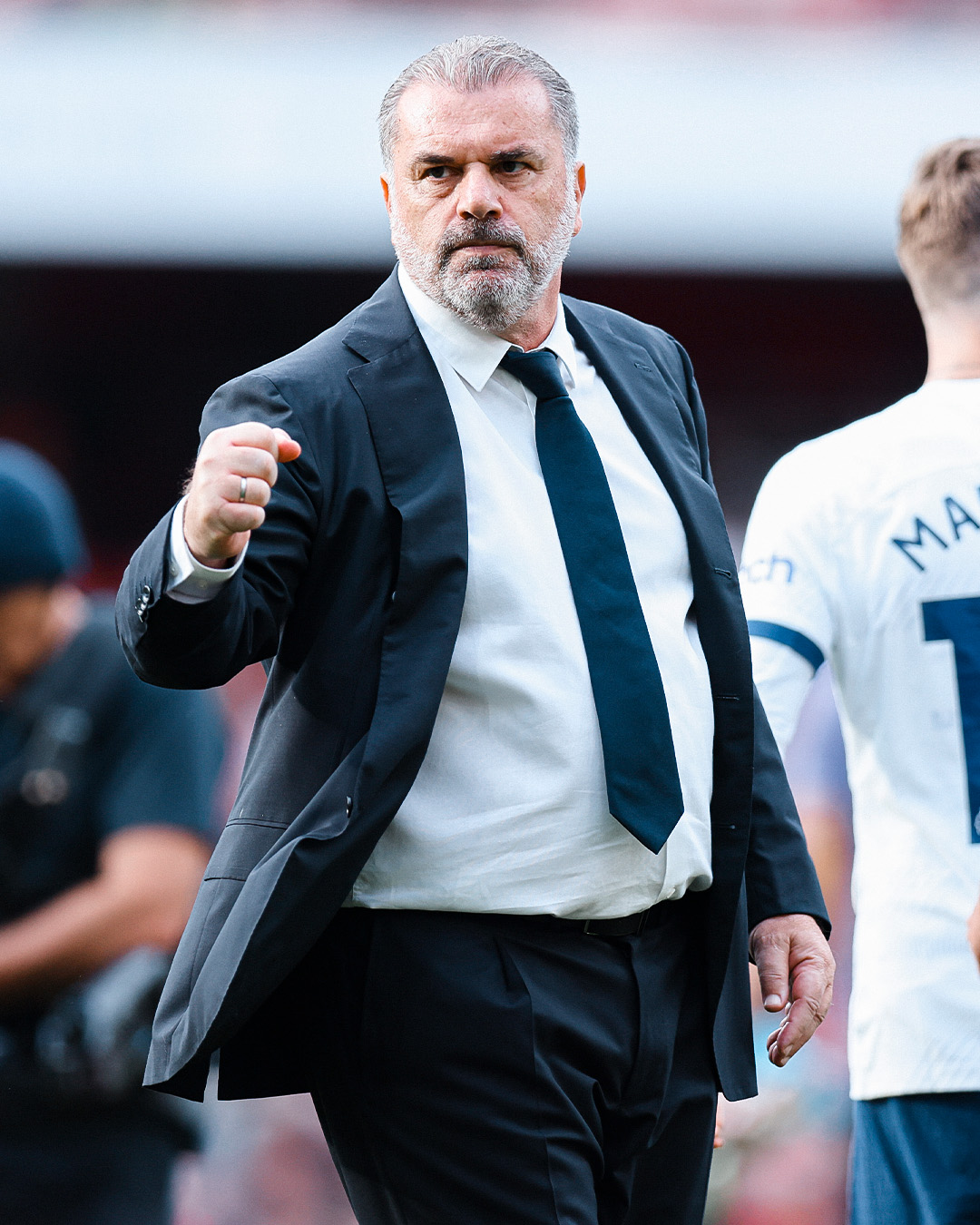 Ange Postecoglou wears a suit for the NLD.