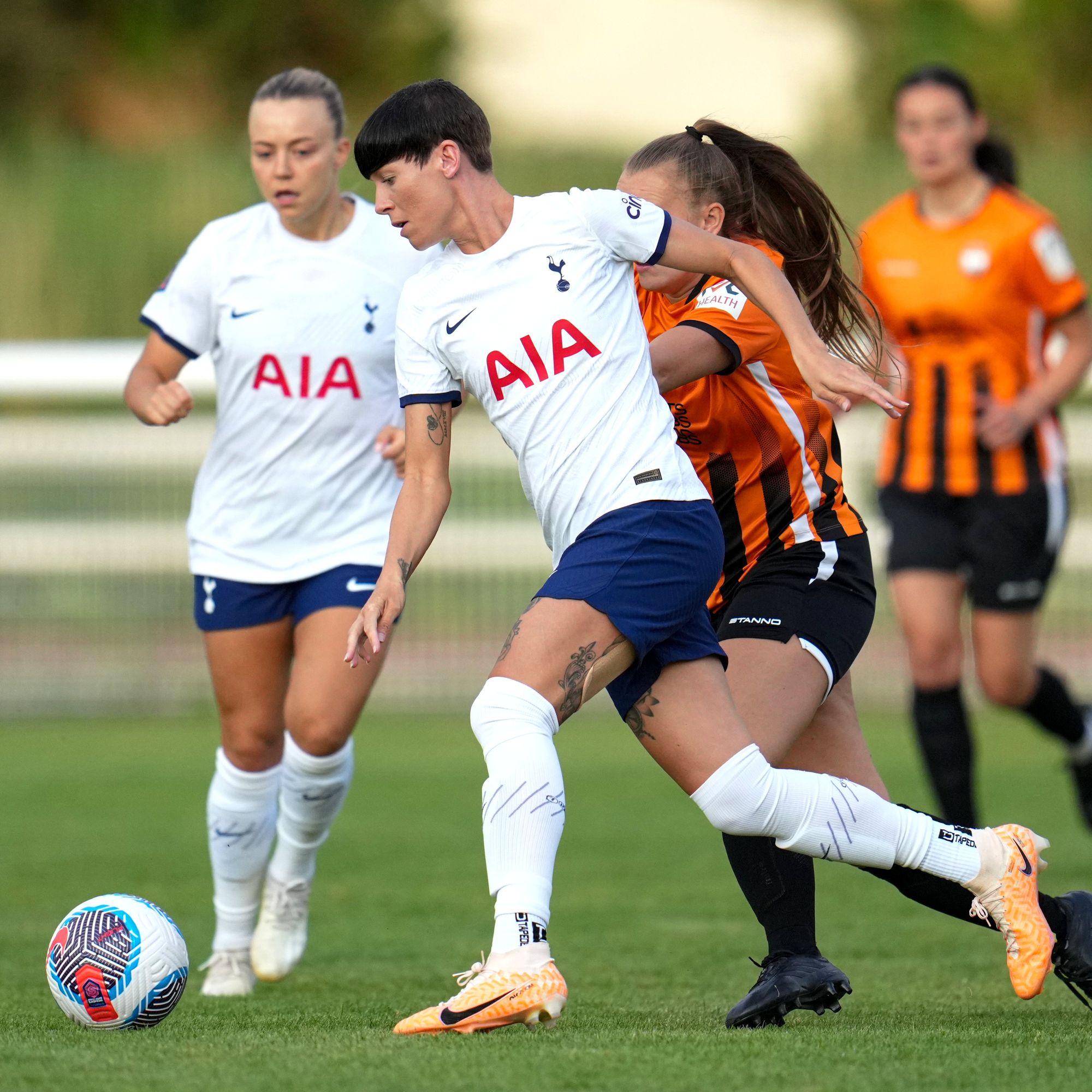 Ash Neville plays in the pre-season friendly against London Bees.