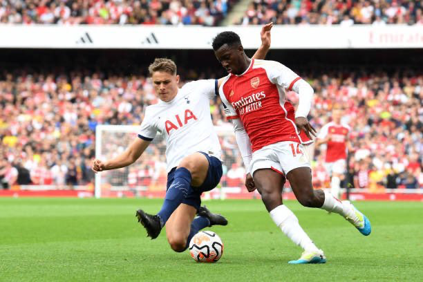 Micky Van de Ven tackles Eddie Nketieh during the NLD.