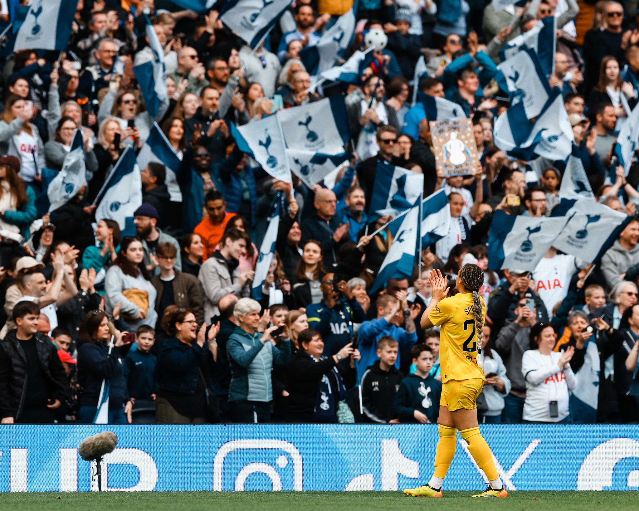 Becky Spencer applauds the fans.