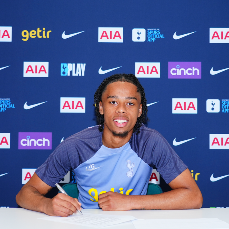 Tyrese Hall signs his new contract.