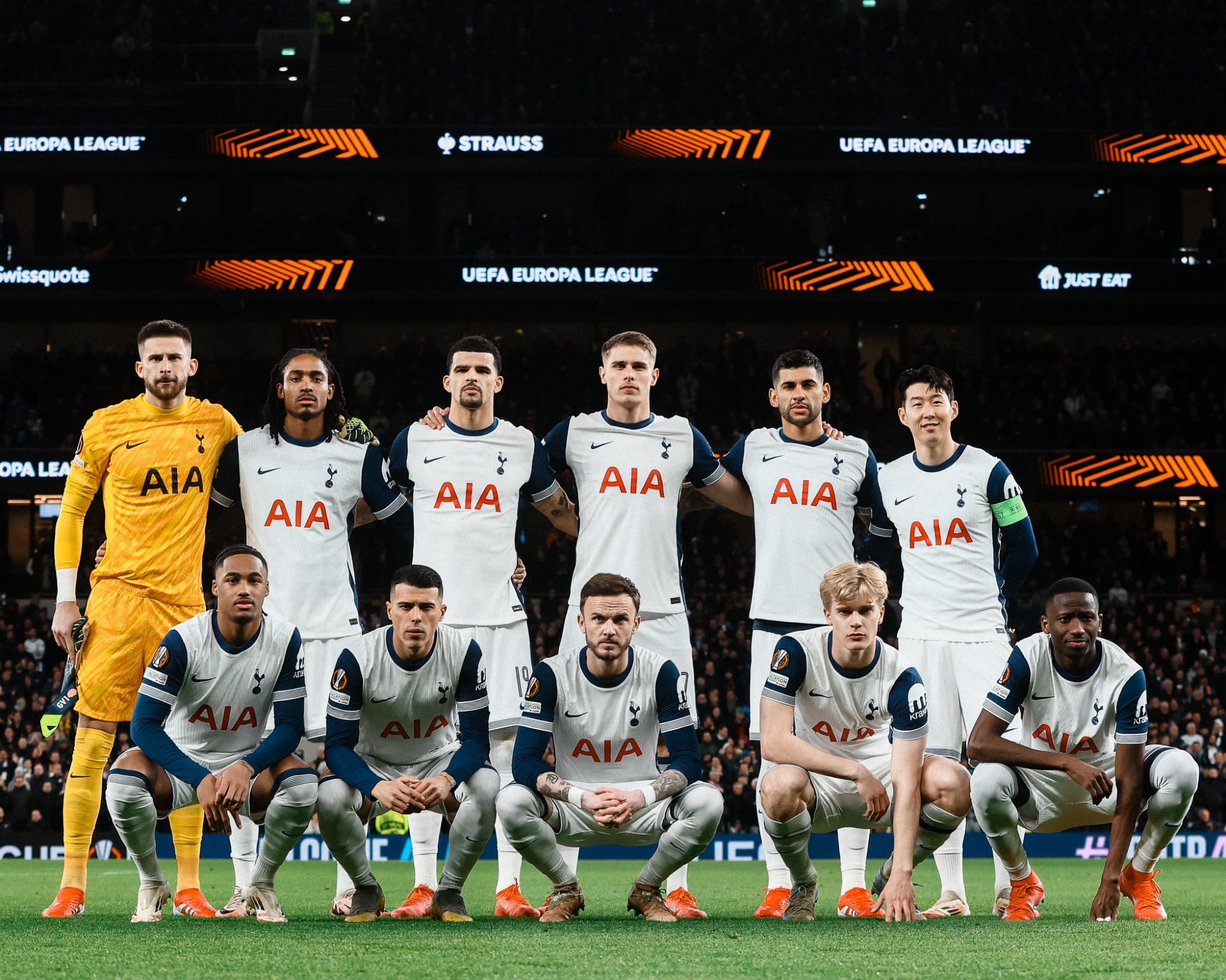 The starting lineup poses before the match.