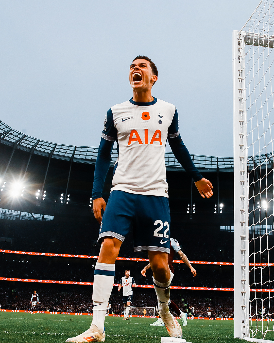 Brennan Johnson roars after scoring a goal.