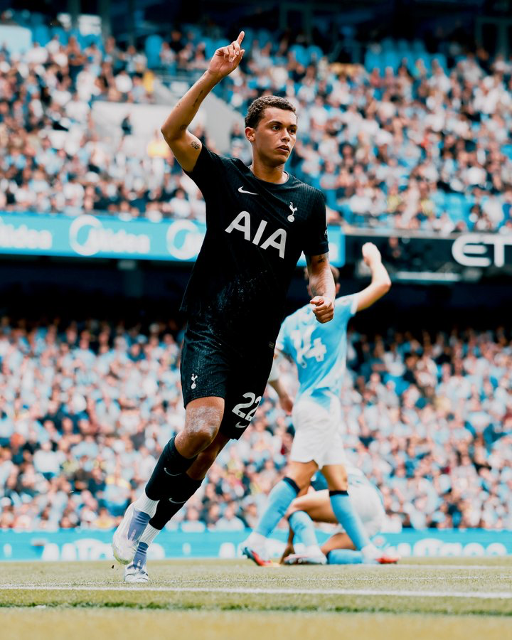 Brennan Johnson holds up one finger after scoring a goal.