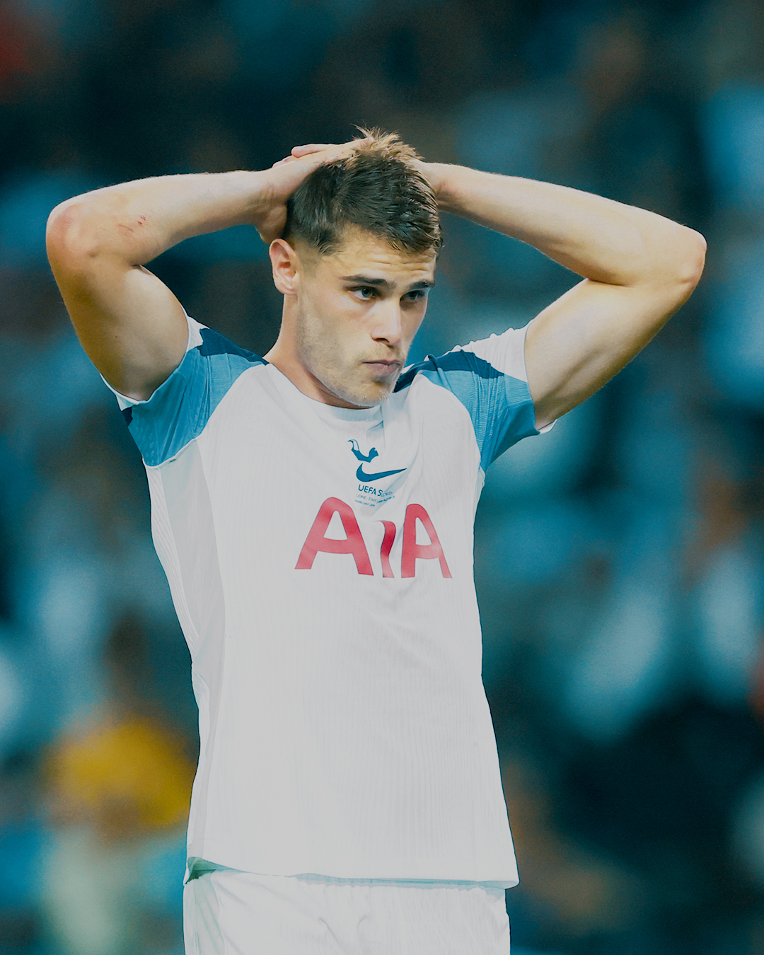 Micky van de Ven holds his hands behind his head and purses his lips in frustration.