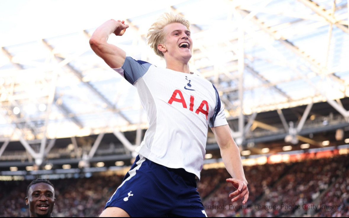 Lucas Bergvall leaps in the air with fist raised.