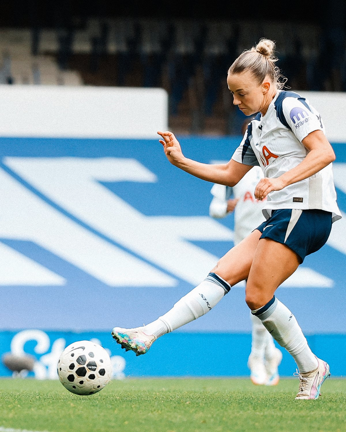 Olga Ahtinen strikes the ball.