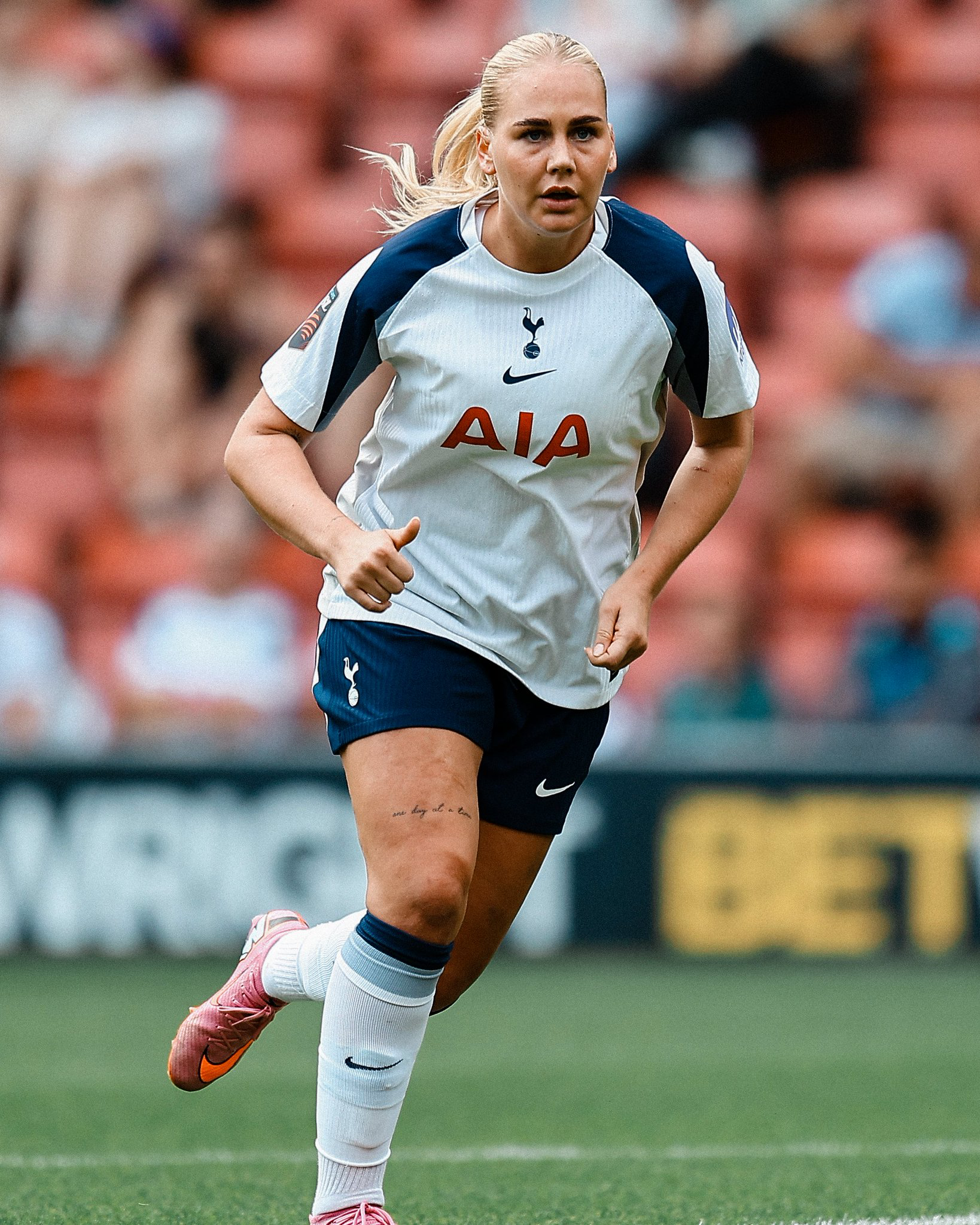 Cathinka Tandberg runs on the pitch for her first appearance.