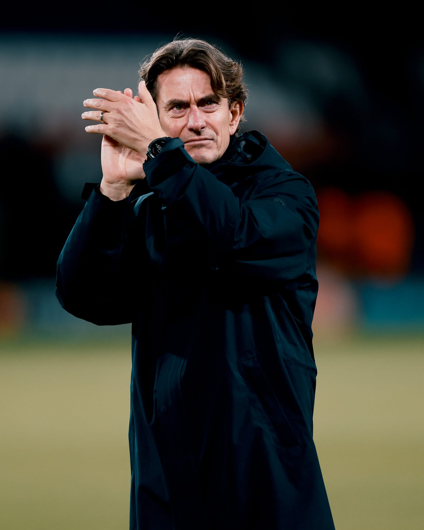 Thomas Frank claps after the game.