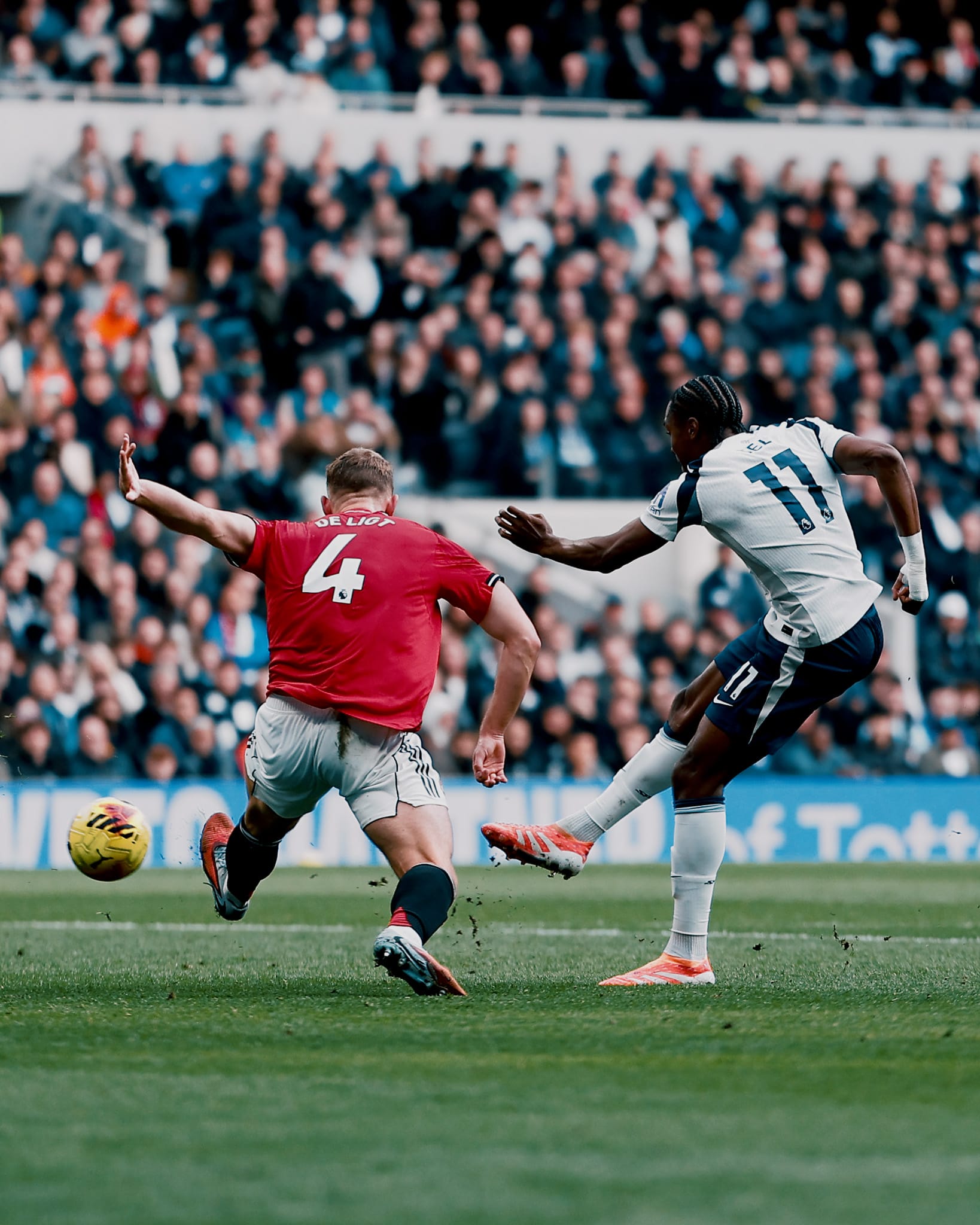 Mathys Tel strikes the ball past Matthijs de Ligt.