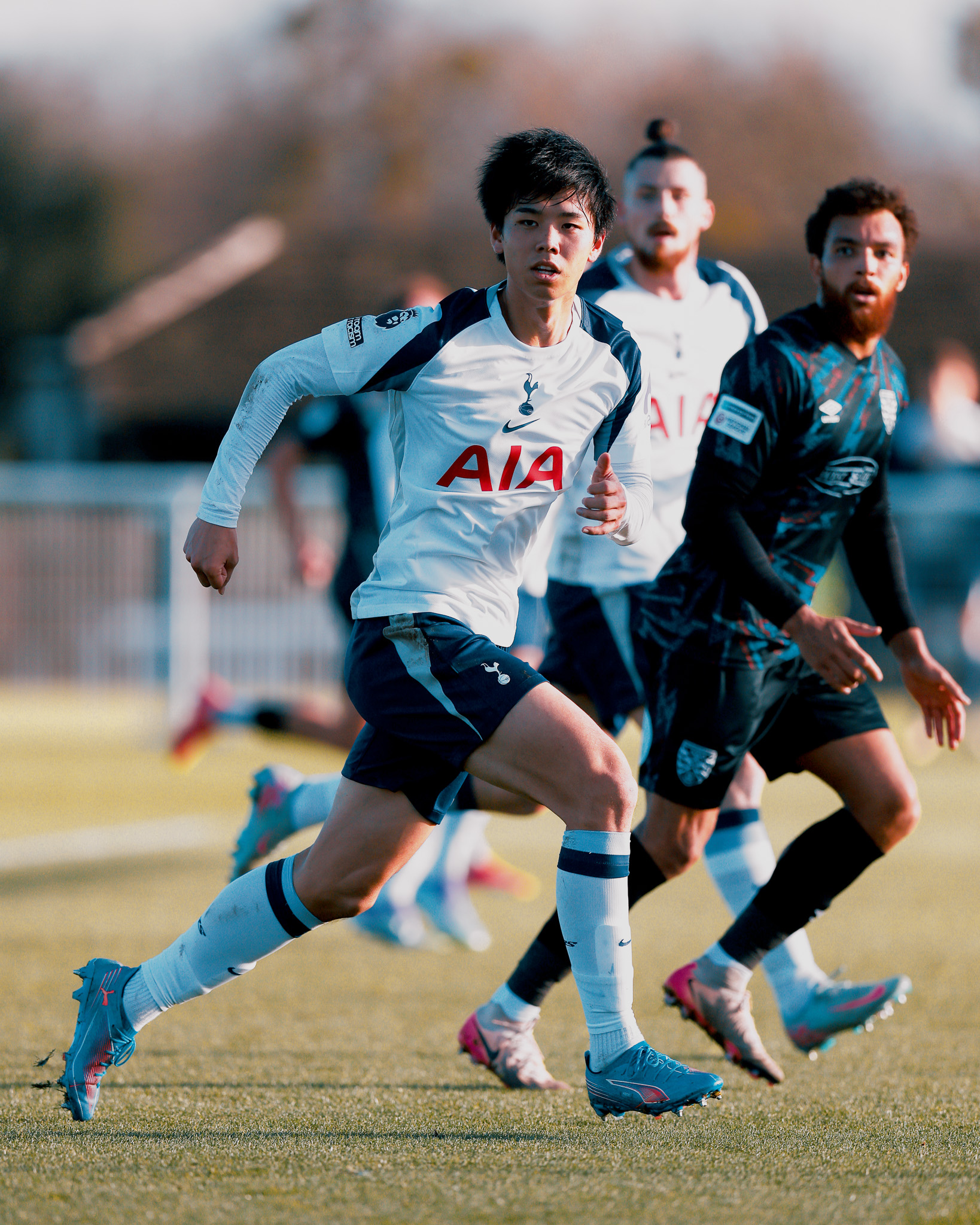 Kōta Takai runs on the pitch.