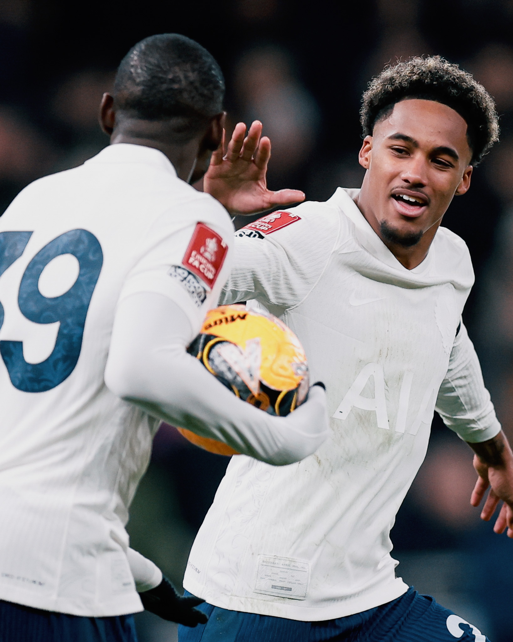 Wilson Odobert reaches to high five Randal Kolo Muani after they combined for a goal.