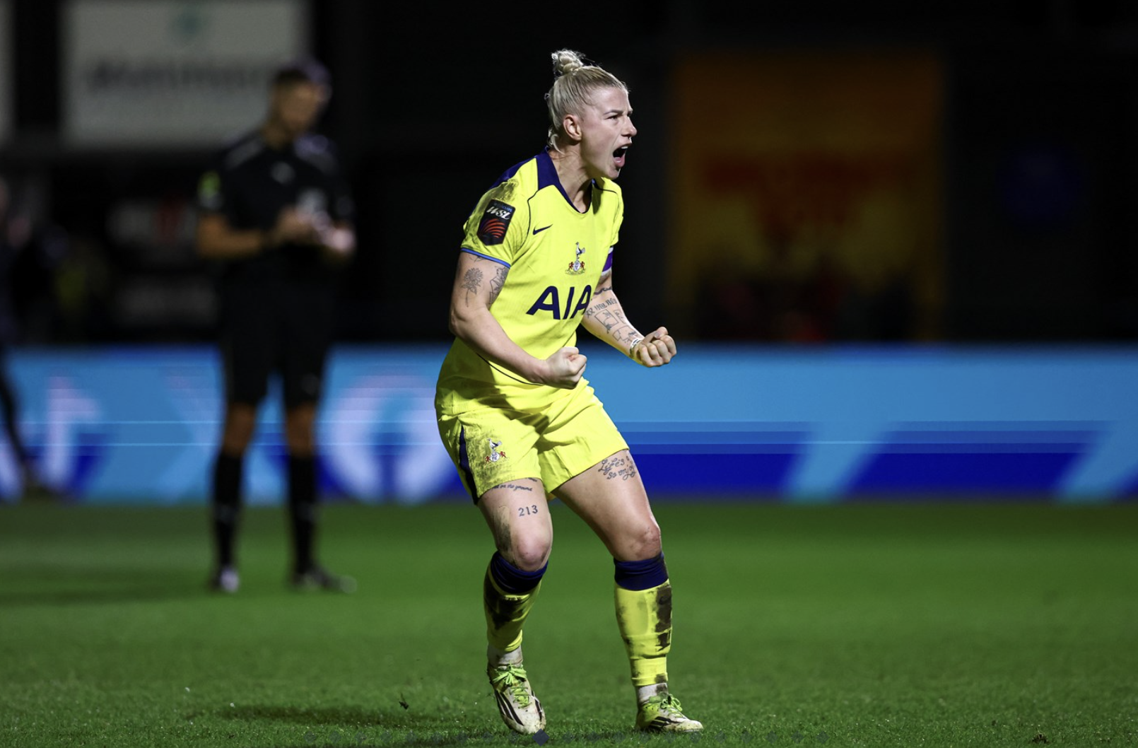 Beth England celebrates after converting her penalty.