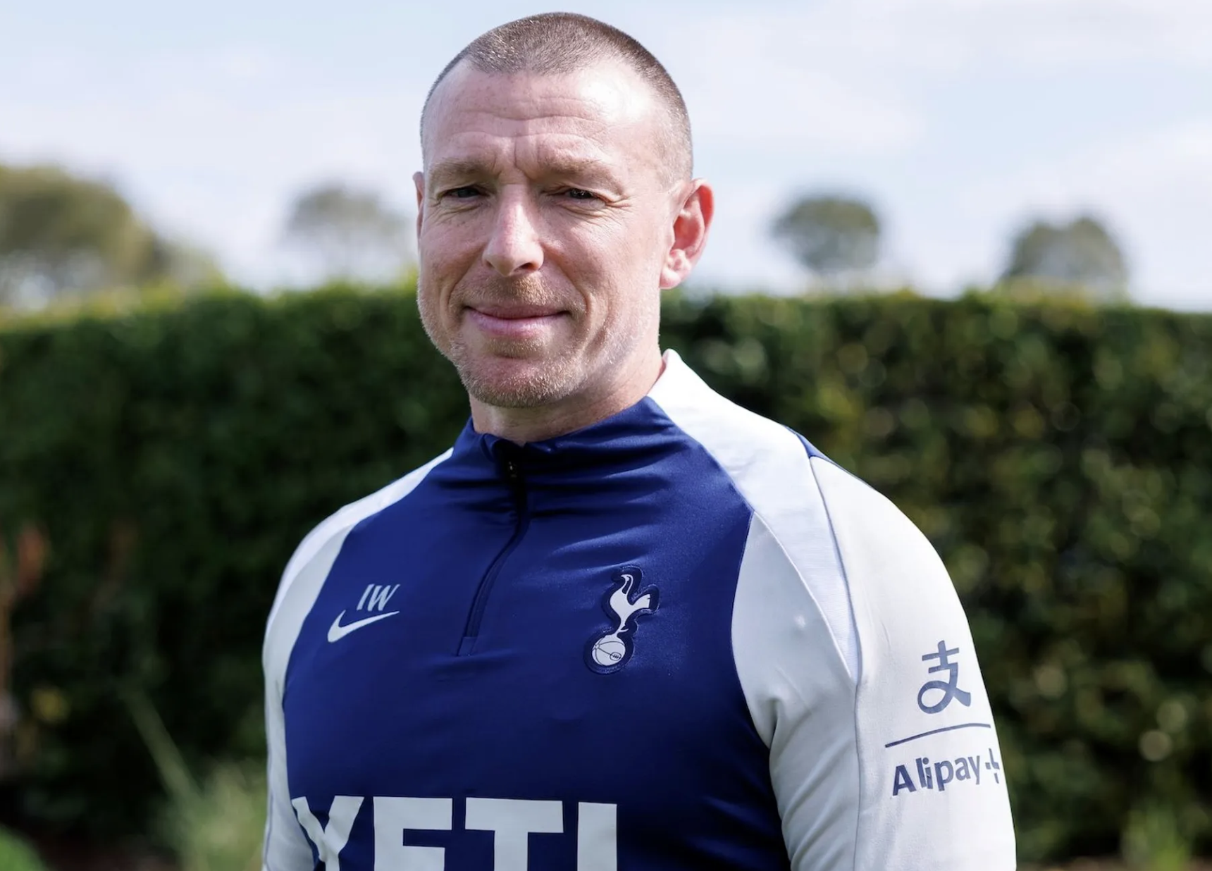 Ian Willcock smiles in his new Spurs training gear.