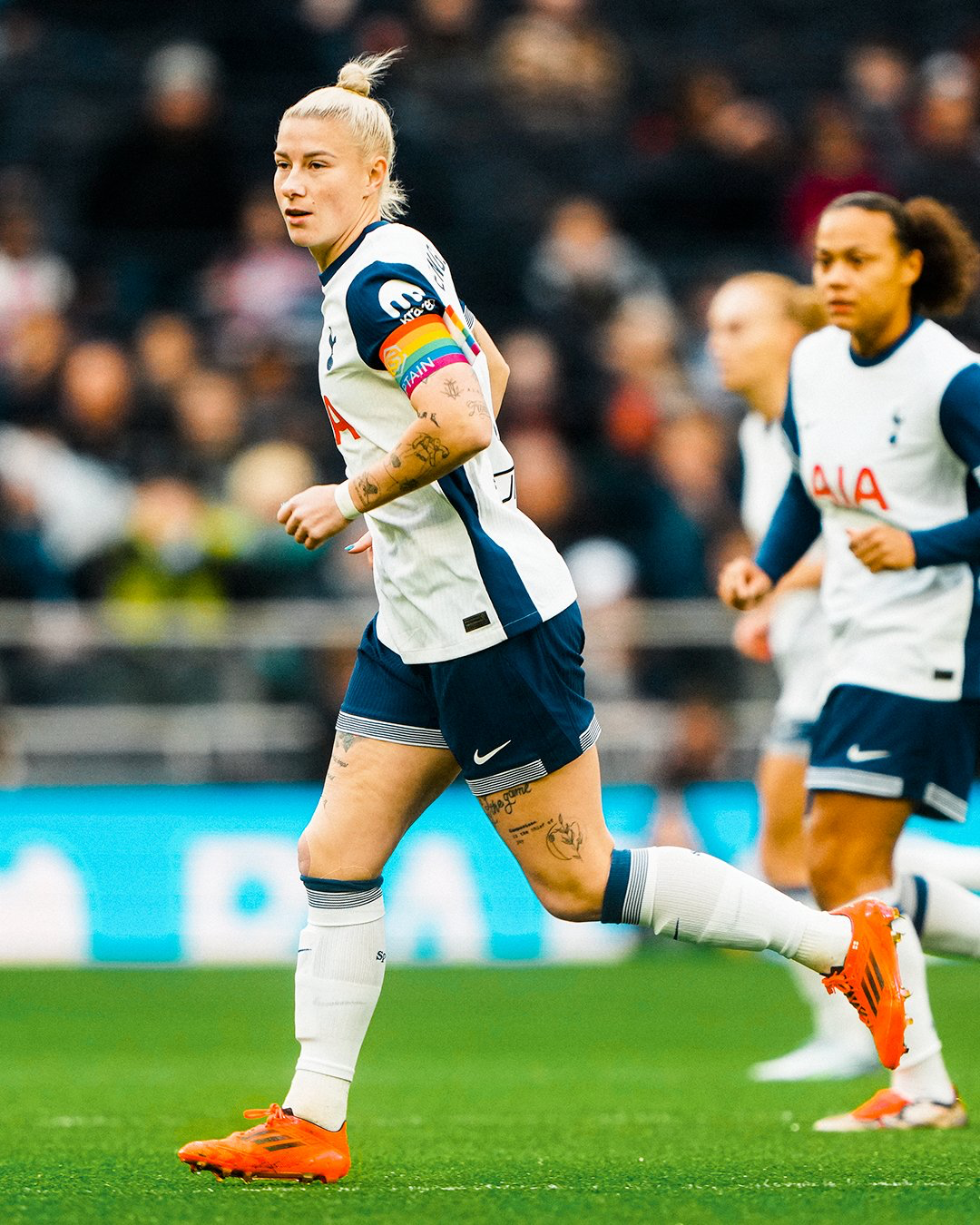 Beth England proudly wearing the rainbow captain's armband.