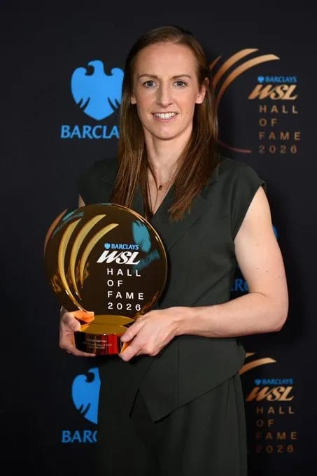 Kerys Herrop poses with her WSL Hall of Fame trophy.