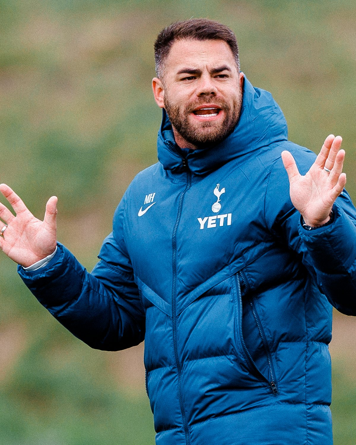 Martin Ho gestures as he coaches.
