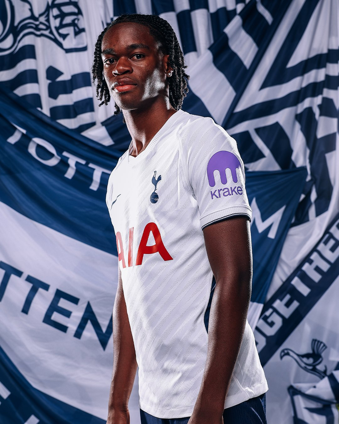 Callum Olusesi models the new home kit.