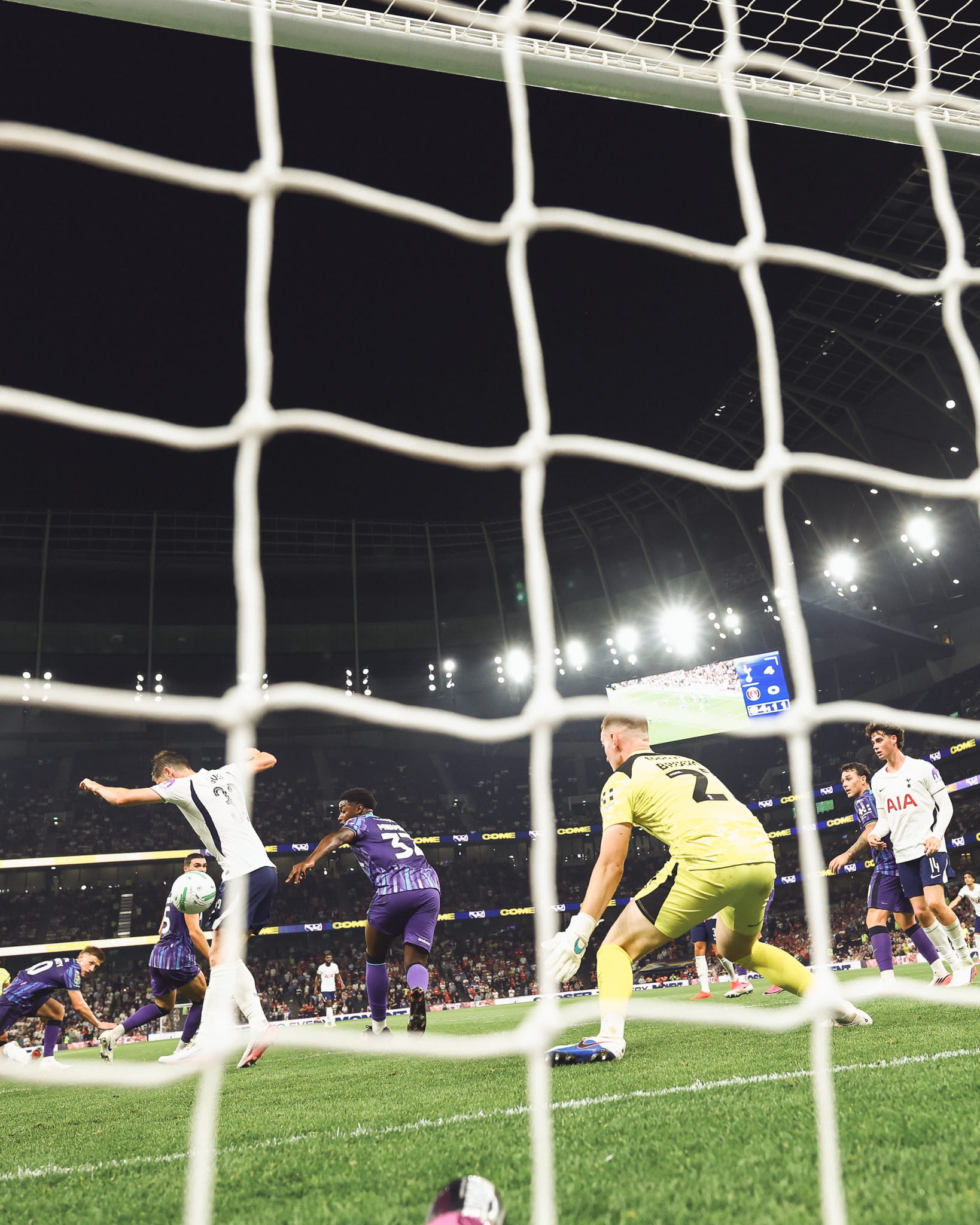 The ball deflects off Ben Davies.