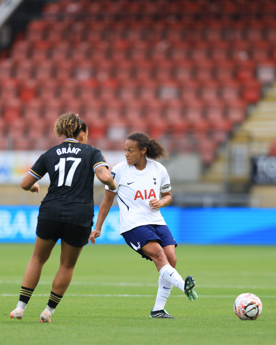 Drew Spence misdirects Chasity Grant as she passes the ball past her.