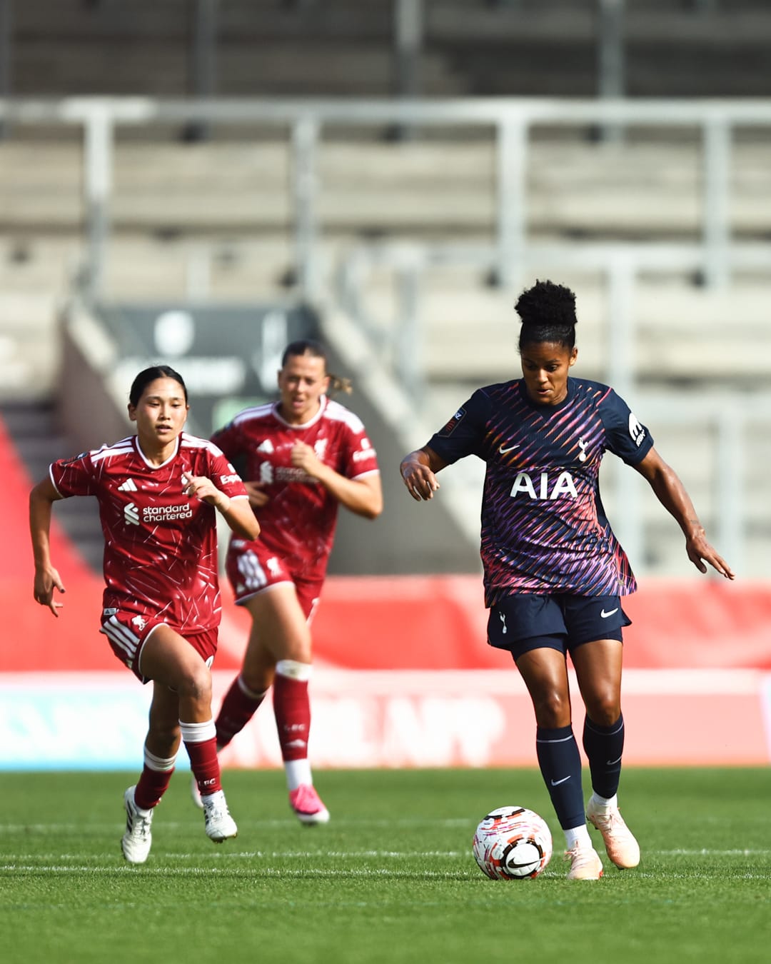 Shekiera Martinez dribbles the ball.